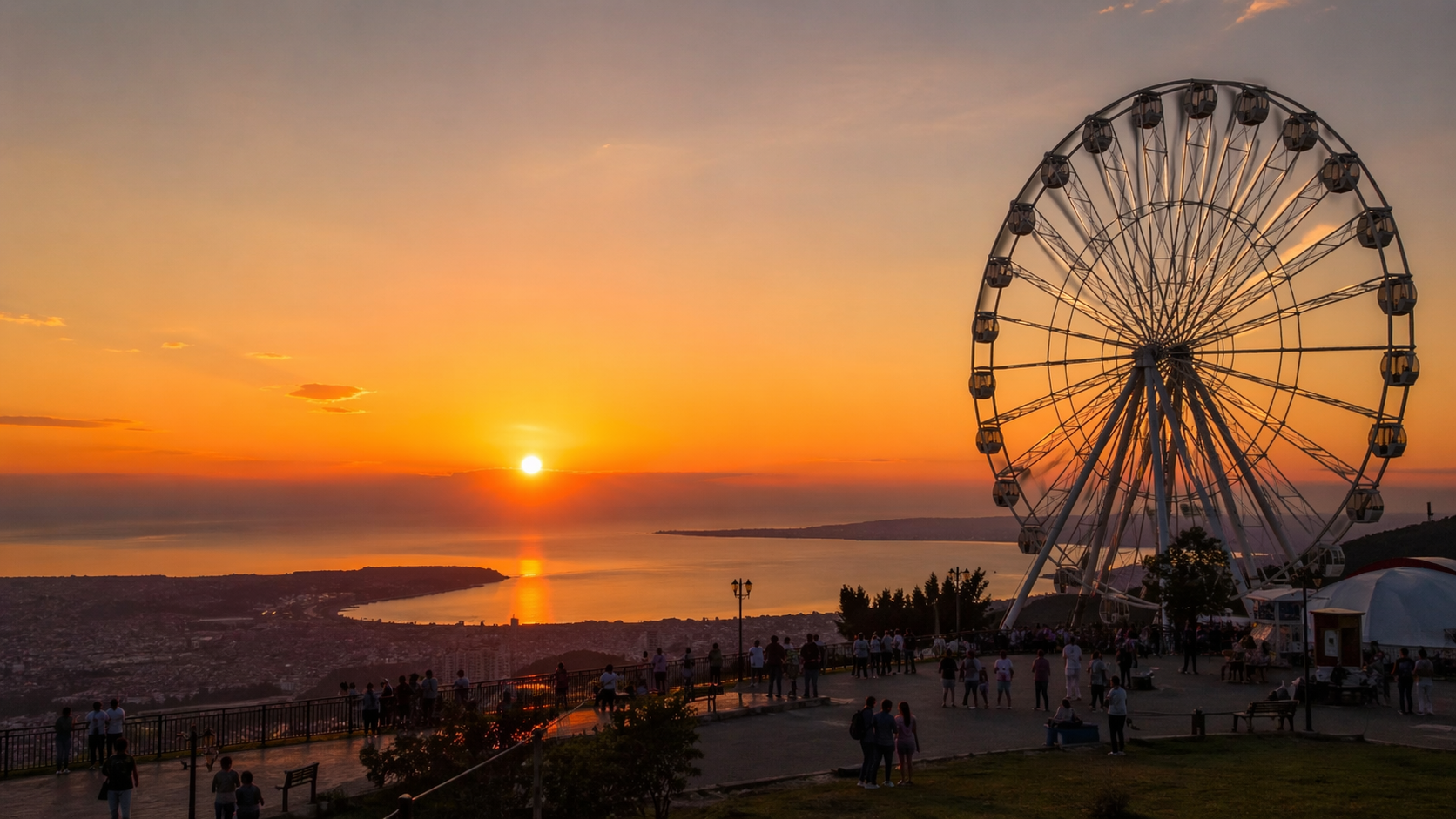 Колесо обозрения парк Олимп закат вид на море